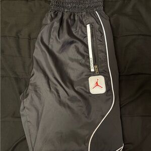 Jordan Black Mesh Track Pants with Red Accents